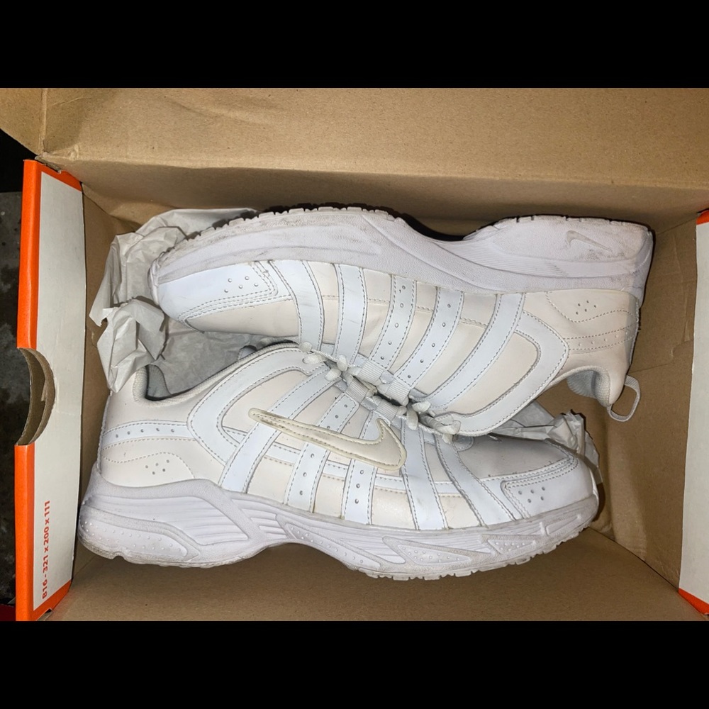 Nike advantage running shoes white in color/off-white.